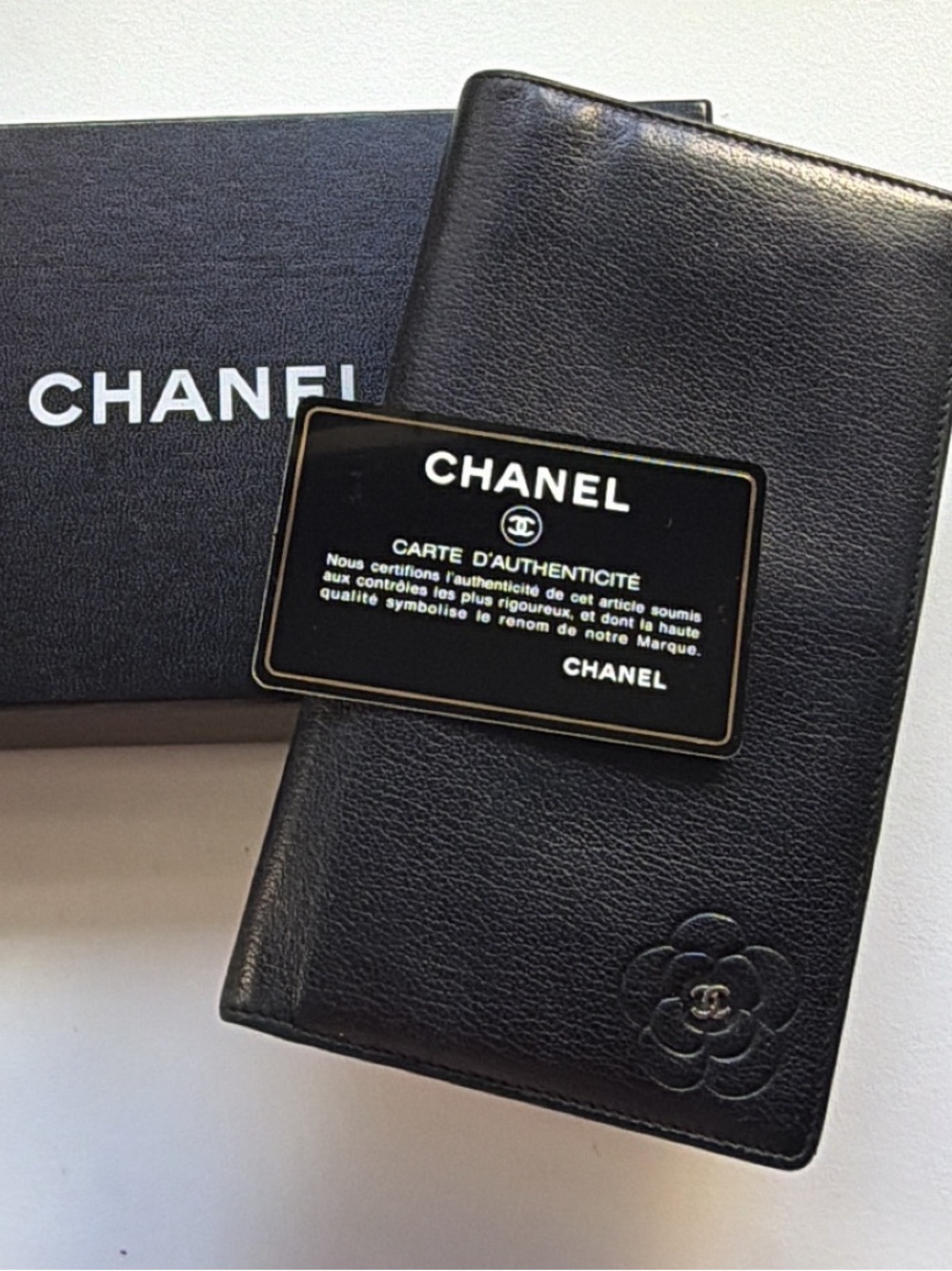 CHANEL Black Camellia Embossed Leather Wallet